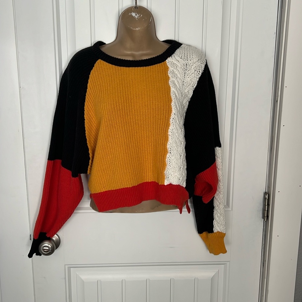 Women’s cable knit sweater